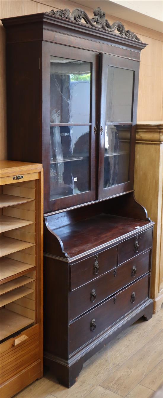 A Victorian mahogany four drawer bookcase W.122cm